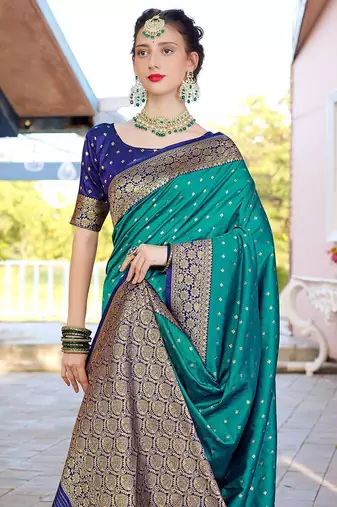 Turquoise turquoise blue & gold-toned ethnic motifs woven design zari banarasi saree