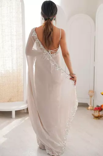 Beige embellished sequinned  chiffon heavy work saree