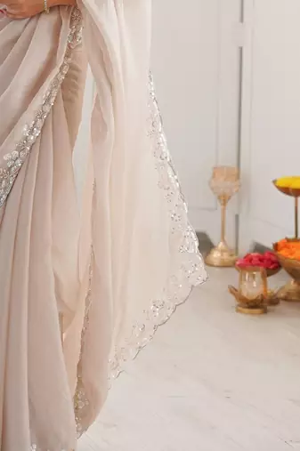 Beige embellished sequinned  chiffon heavy work saree