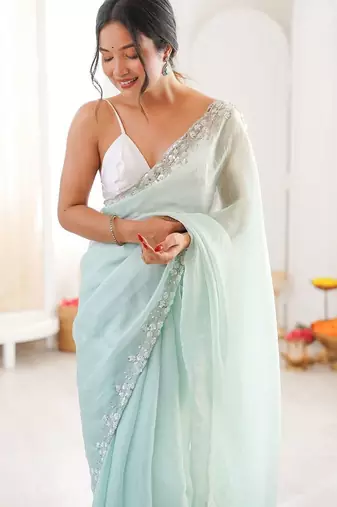 Sea green embellished sequinned  chiffon saree