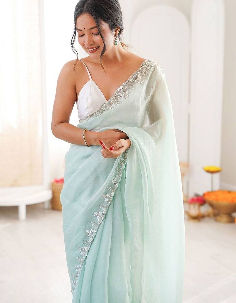Sea green embellished sequinned  chiffon saree