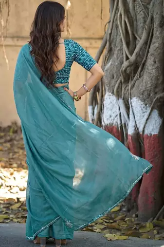 Teal embellished sequinned silk blend heavy work saree