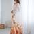 White women floral white  chiffon floral printed party wear saree