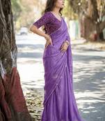 Purple ethnic motifs embroidered silk blend heavy work saree