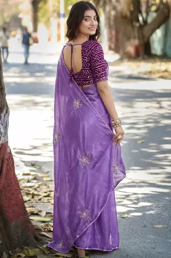 Purple ethnic motifs embroidered silk blend heavy work saree
