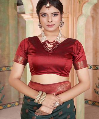 Green ethnic motifs zari silk blend kanjeevaram saree 5