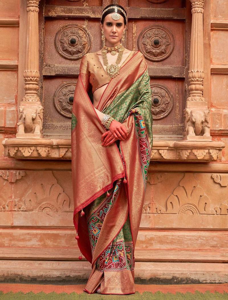 Green woven design printed zari  patola saree