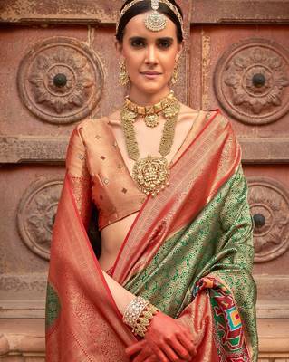 Green woven design printed zari  patola saree 2