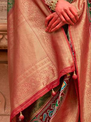 Green woven design printed zari  patola saree 4