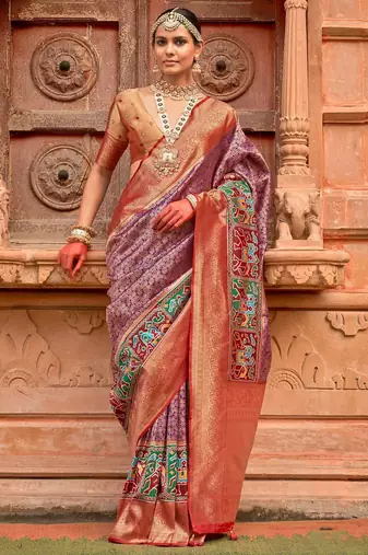 Purple woven design zari traditional festive wear patola saree