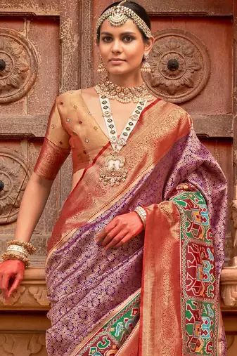 Purple woven design zari traditional festive wear patola saree