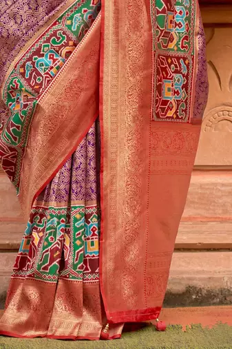 Purple woven design zari traditional festive wear patola saree