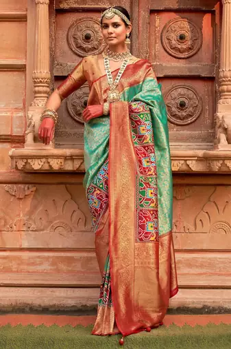 Green woven design zari patola saree