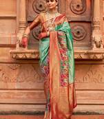 Green woven design zari patola saree