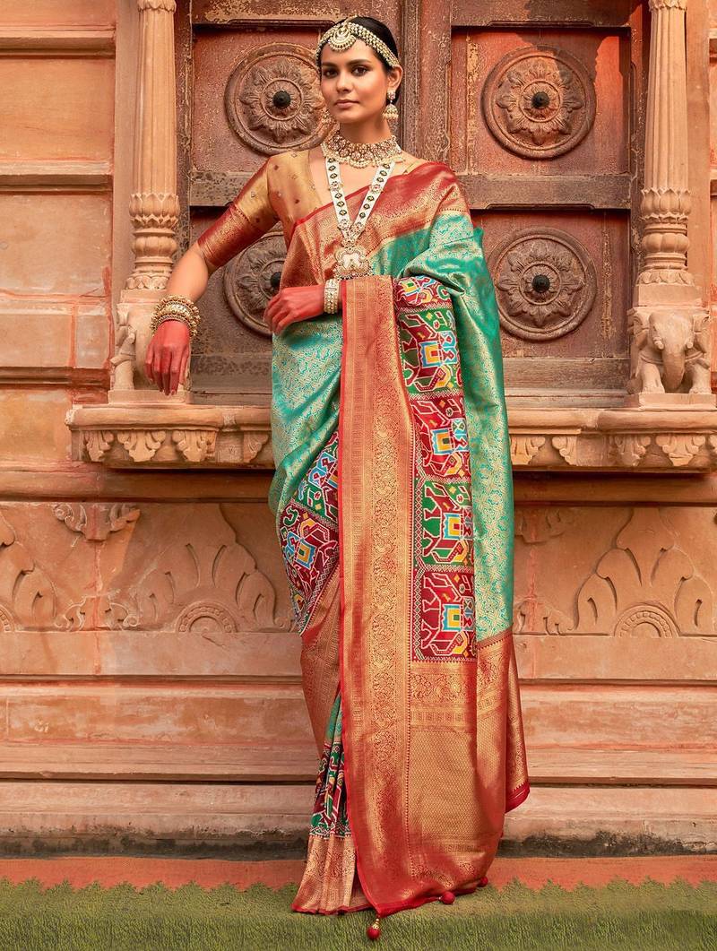Green woven design zari patola saree