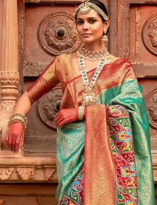Green woven design zari patola saree 2