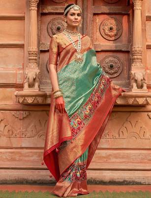 Green woven design zari patola saree 3