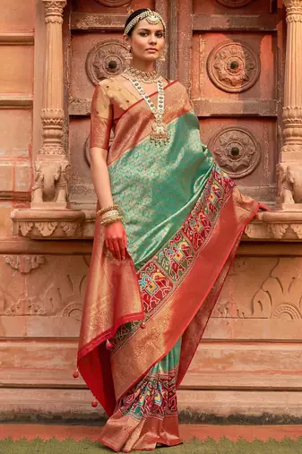 Green woven design zari patola saree