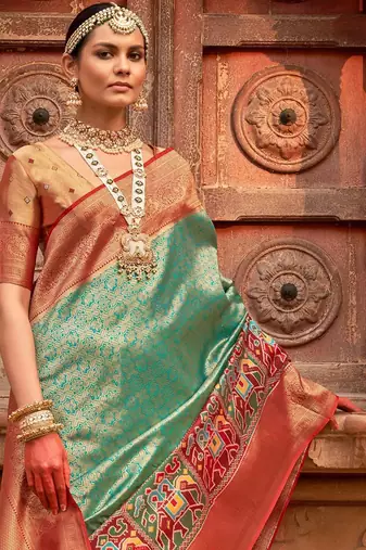 Green woven design zari patola saree