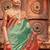 Green woven design zari patola saree