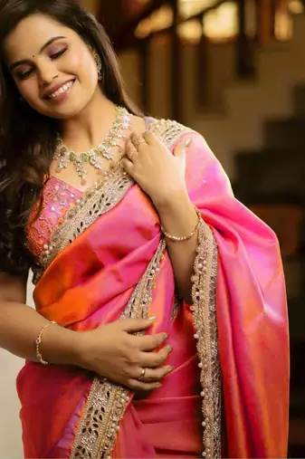 Pink solid embellished mirror work tissue celebrity saree