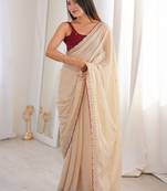 Cream embellished sequinned  georgette saree