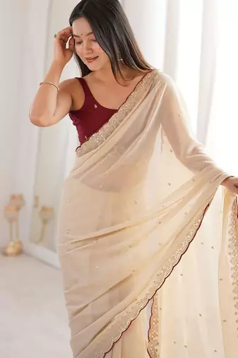 Cream embellished sequinned  georgette saree