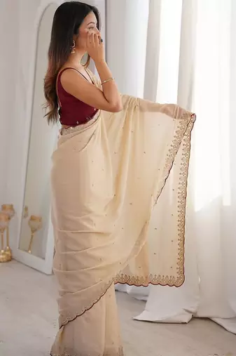 Cream embellished sequinned  georgette saree