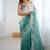Teal ethnic motifs embroidered sequinned  chiffon saree with matching blouse