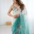 Teal ethnic motifs embroidered sequinned  chiffon saree with matching blouse