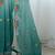Teal ethnic motifs embroidered sequinned  chiffon saree with matching blouse