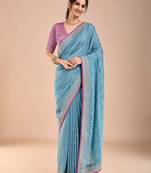 Blue ethnic motifs beads and stones saree