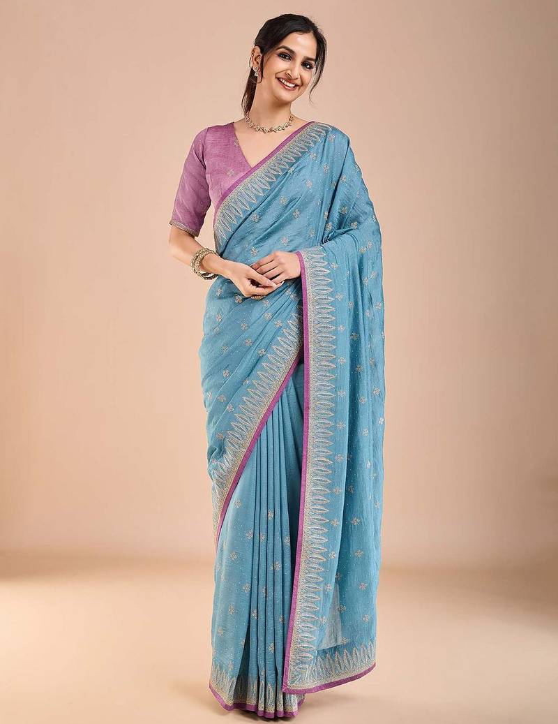 Blue ethnic motifs beads and stones saree