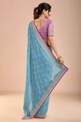 Blue ethnic motifs beads and stones saree