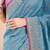 Blue ethnic motifs beads and stones saree