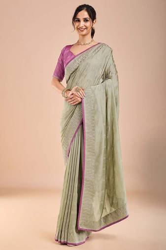 Sea green floral embroidered beads and stones saree