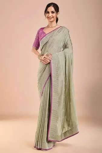 Sea green floral embroidered beads and stones saree