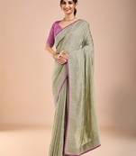 Sea green floral embroidered beads and stones saree