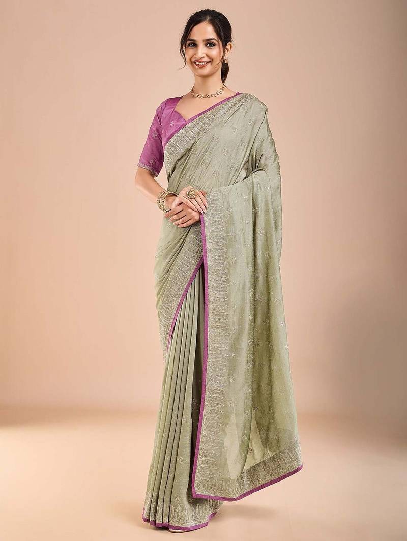 Sea green floral embroidered beads and stones saree