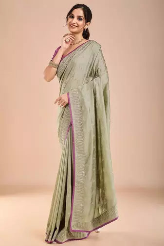 Sea green floral embroidered beads and stones saree