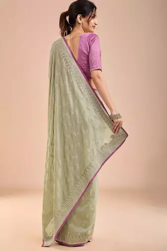 Sea green floral embroidered beads and stones saree