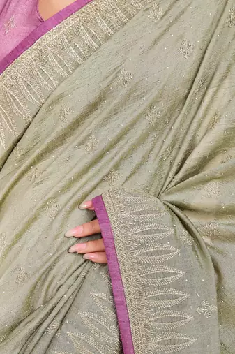 Sea green floral embroidered beads and stones saree