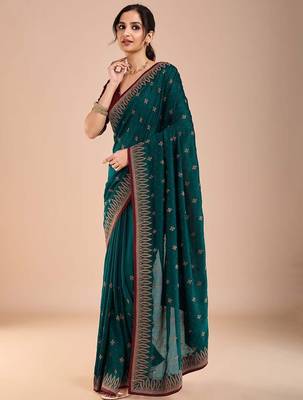 Teal ethnic motifs embroidered beads and stones saree 2