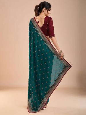 Teal ethnic motifs embroidered beads and stones saree 3