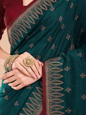 Teal ethnic motifs embroidered beads and stones saree 5