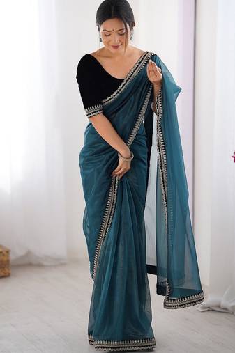 Teal embroidered embellished saree