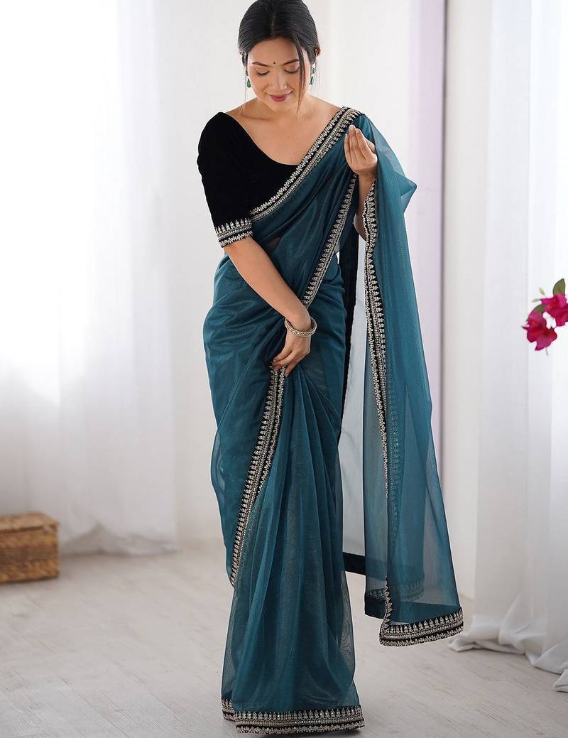Teal embroidered embellished saree