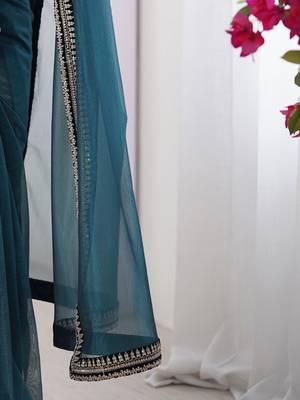Teal embroidered embellished saree 5