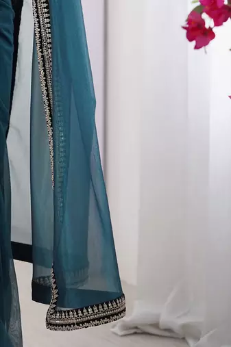 Teal embroidered embellished saree