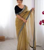 Brown solid embroidered net saree